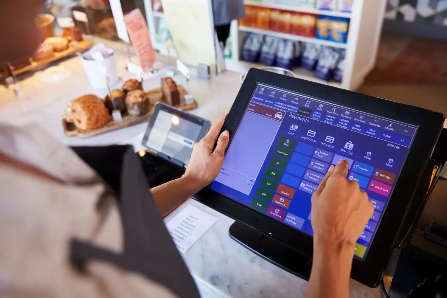 Employee working at delicatessen counter
